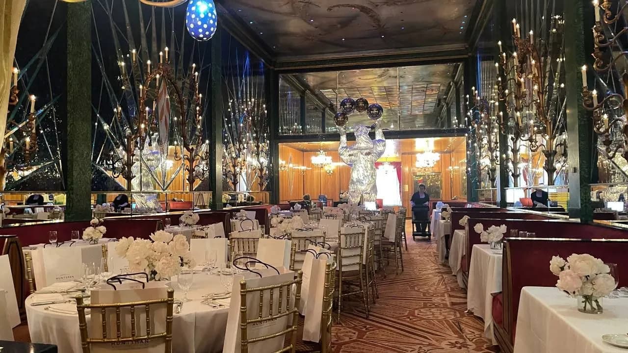 Russian Tea Room dining room with gold chairs and peonies