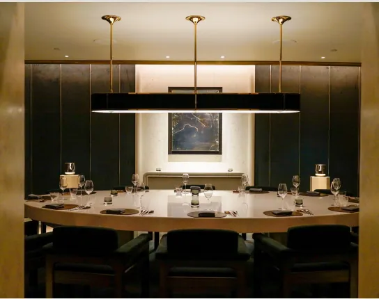 ONYX Dining Room with an oval table set for a private dinner